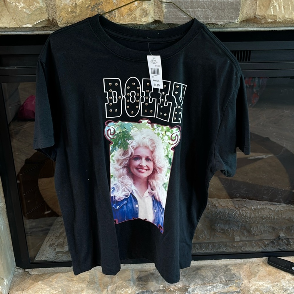 Dolly  shirt brand new. Size medium
